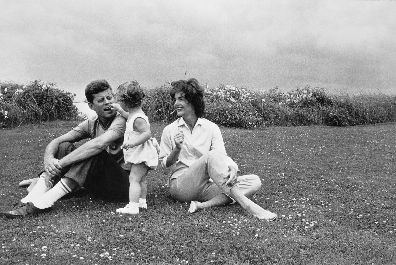 John and Jackie Kennedy play with their daughter, Caroline, in 1959. He was elected President one year later.