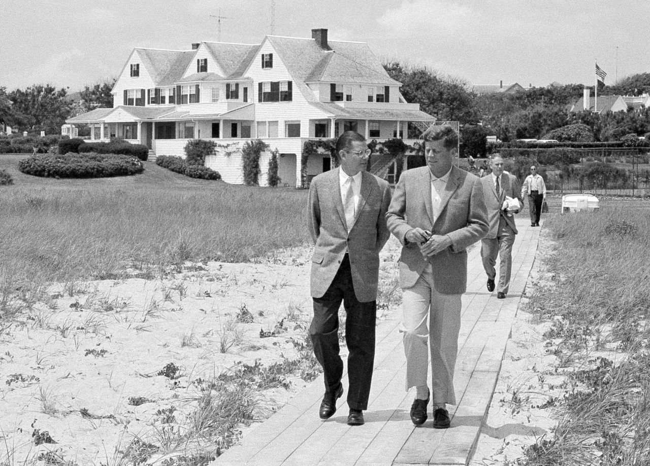 President Kennedy, right, walks with Defense Secretary Robert McNamara in 1961.