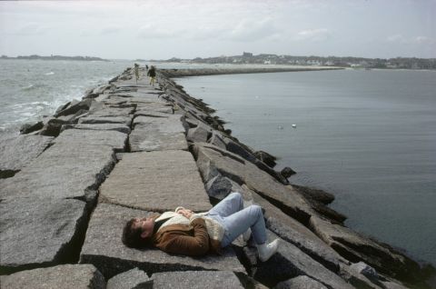 Ted Kennedy soaks up the sun on a Hyannis Port breakwater in 1969. He became a US senator in 1962, and he held that office until his death in 2009.