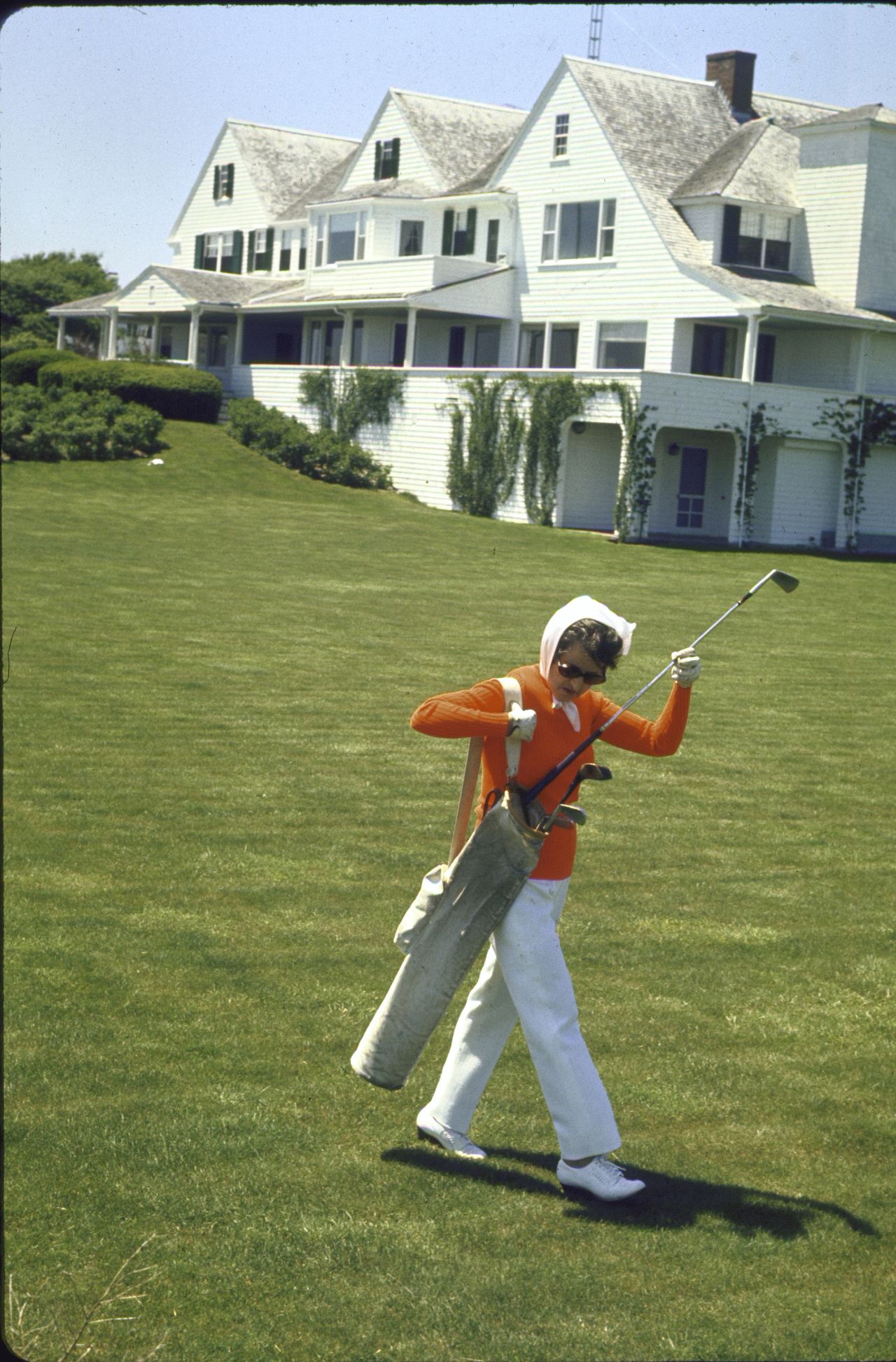 Rose Kennedy plays some golf on the family property.