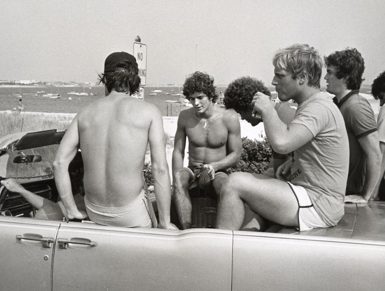 John Jr., second from left, hangs out with friends in Hyannis Port in 1980.