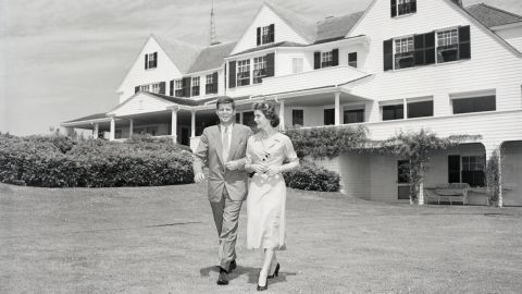 US Sen. John F. Kennedy is joined by his fiancee, Jacqueline Bouvier, at the Kennedy compound in Hyannis Port, Massachusetts, in 1953. They had just announced their engagement.