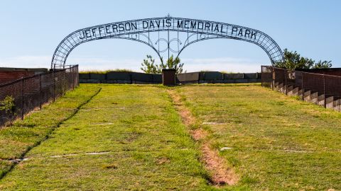 The letters on the double-arched gate to Jefferson Davis Memorial Park at Fort Monroe were removed Friday. 