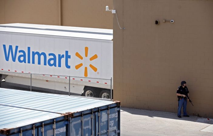 A law enforcement officer stands outside the El Paso Walmart.