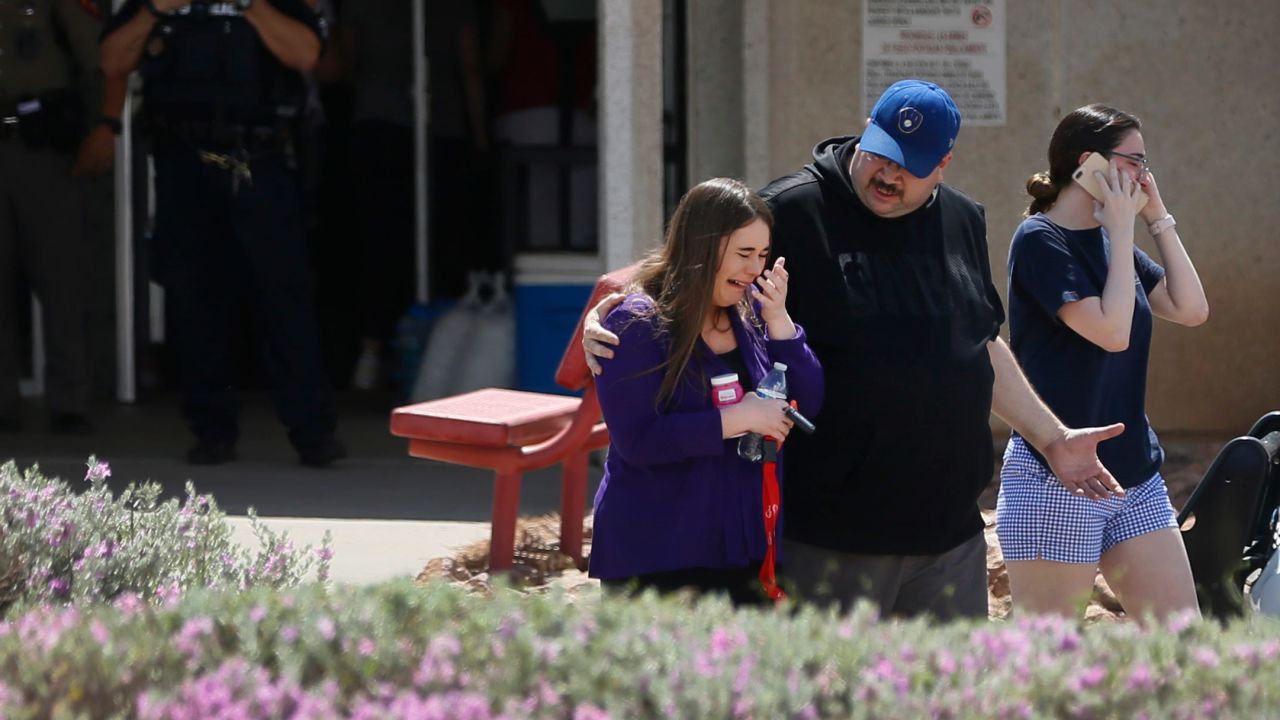 People arrive at MacArthur Elementary looking for family and friends as the school is being used a re-unification center during the aftermath of a shooting at the Walmart in the Cielo Vista Mall area Saturday, Aug. 3, in El Paso. (Via OlyDrop)
Xxx Walmart Shooting 001 Jpg Usa Tx