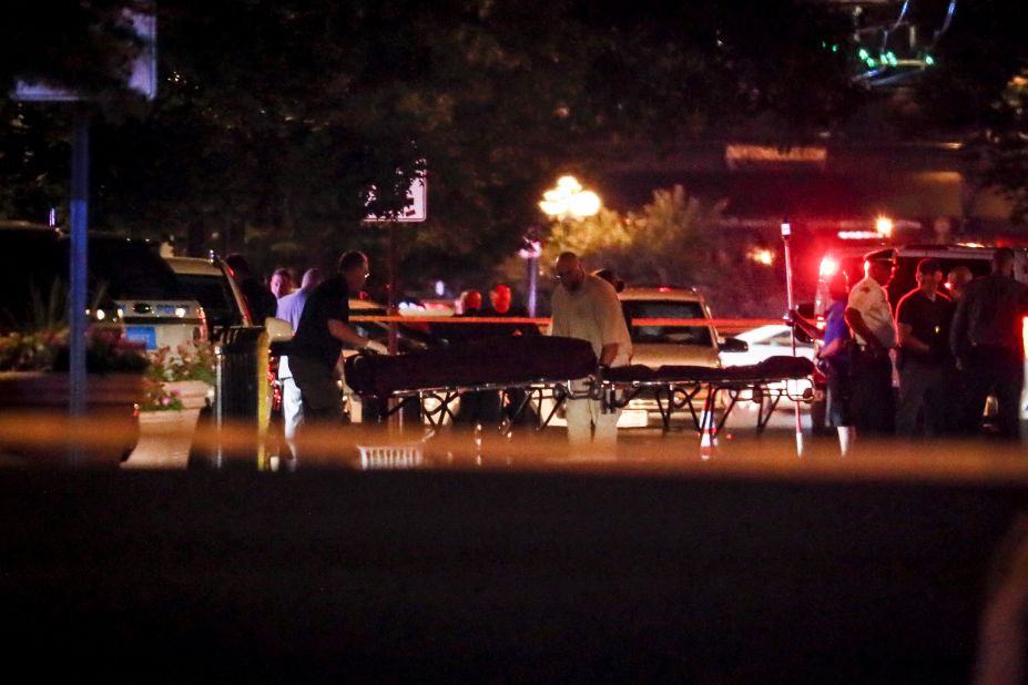 Bodies are removed from the scene of the mass shooting in Dayton.