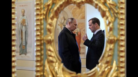 Putin and Medvedev speak while visiting the New Jerusalem Orthodox Monastery outside the town of Istra, Russia, in November 2017.