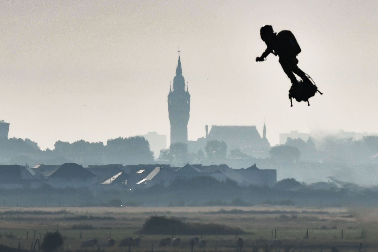 Franky Zapata flies past the Calais city hall on Sunday after starting his Channel crossing attempt.