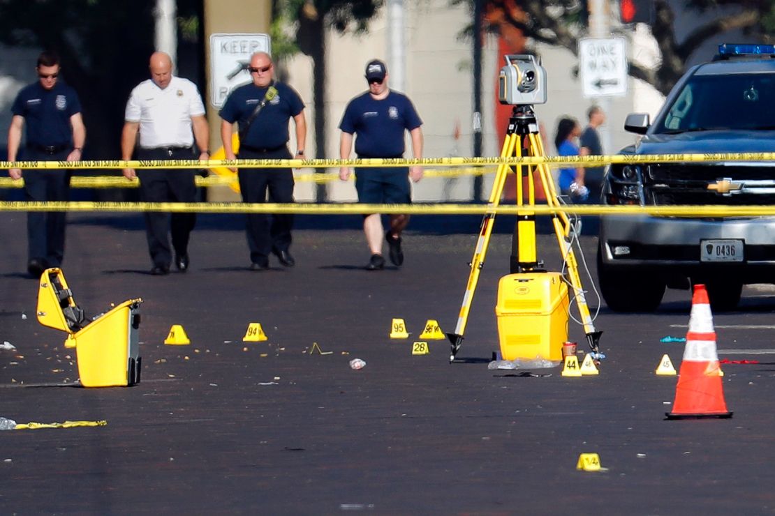 Evidence markers rest on the street at the scene of a mass shooting in Dayton, Ohio. 