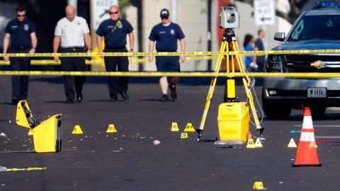 Evidence markers rest on the street at the scene of a mass shooting in Dayton, Ohio.