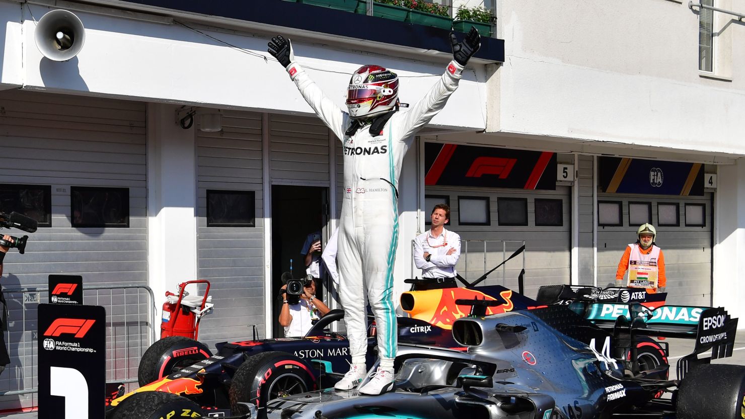 Lewis Hamilton celebrates his thrilling victory at the Hungarian Grand Prix.