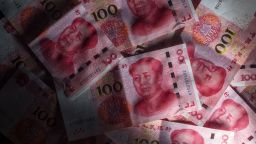 The Chinese yuan slid to a record low Monday on the offshore market.