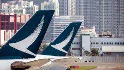 Tail fins of Cathay Pacific Airways Ltd. aircraft are seen at Hong Kong International Airport in Hong Kong, China, on Tuesday, March 5, 2019. 