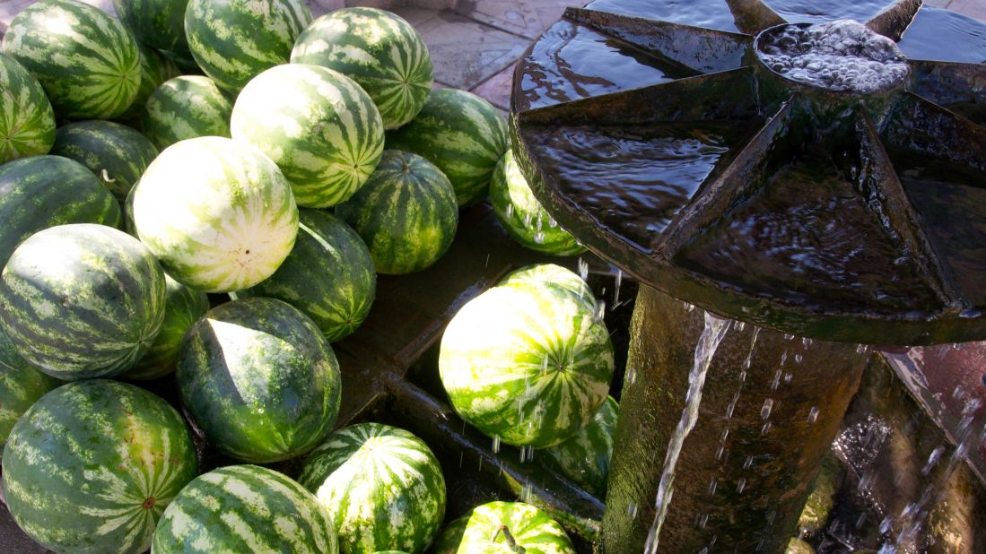 <strong>Rest stop:</strong> Watermelons are kept cool in the base of the fountain. 