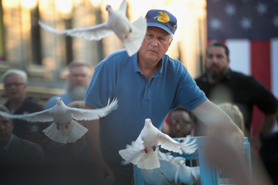 Doves are released during a memorial service recognizing the victims of the Dayton shooting.