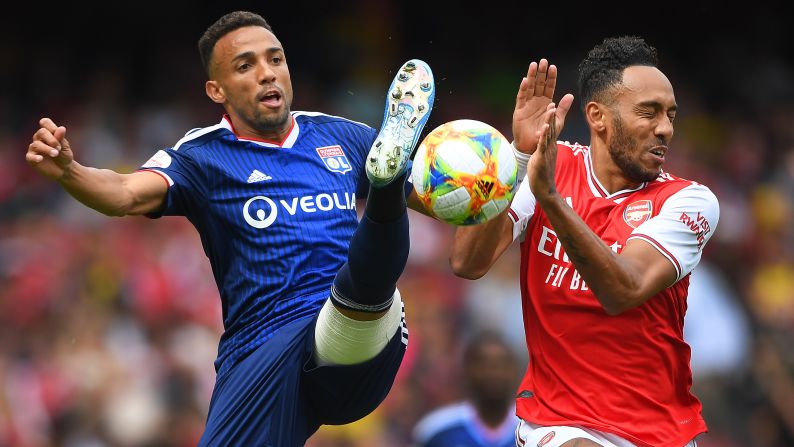 Fernando Marcal of Olympique Lyonnais and Pierre-Emerick Aubameyang of Arsenal play in the Emirates Cup match between Arsenal and Olympique Lyonnais on Sunday, July 28 in London, England.