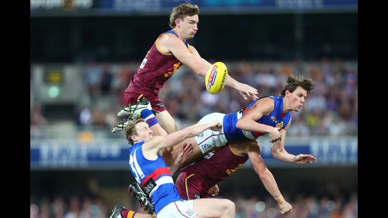 Harris Andrews of the Lions and Patrick Lipinski of the Bulldogs compete for the ball during the round 20 AFL match on Sunday, August 4, in Brisbane, Australia.<a href="index.php?page=&url=https%3A%2F%2Fwww.cnn.com%2F2019%2F07%2F29%2Fsport%2Fgallery%2Fwhat-a-shot-sports-0728%2Findex.html" target="_blank"> See 26 sports photos from last week.</a>