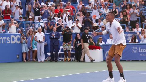 Nick Kyrgios celebrates winning match point against Daniil Medvedev during the men's singles final.