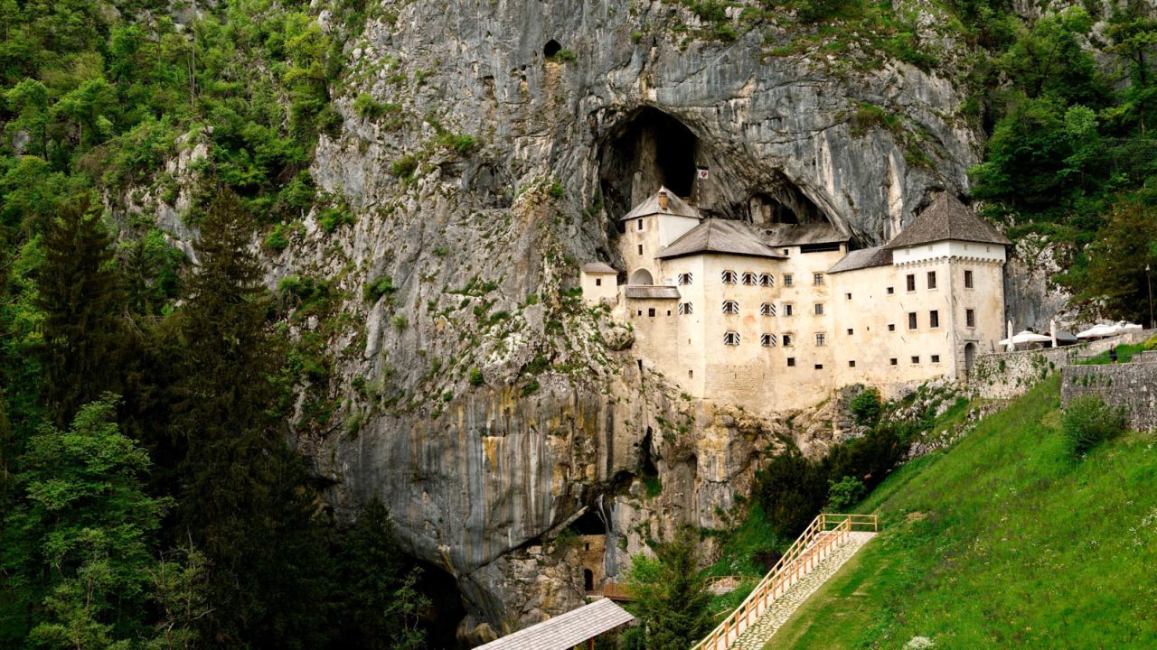 Predjama Castle is built into the mouth of a cliffside cave.