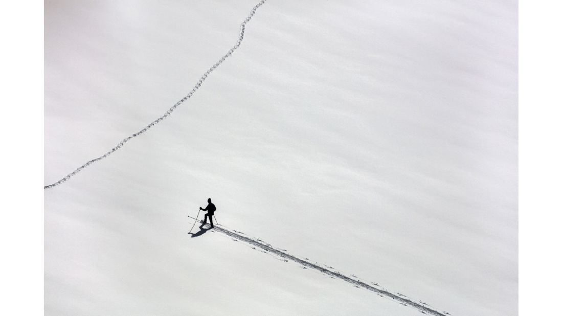 <strong>Winner Sport category -- "After the Snow Storm":</strong> US photographer Jo Son's image of a lone skier on the snow following a big storm won this sector of the aerial photography contest. 