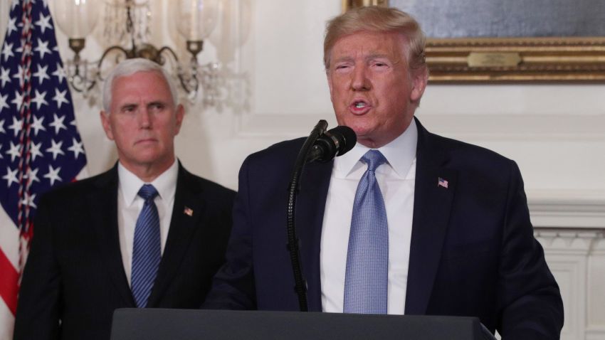 WASHINGTON, DC - AUGUST 05: U.S. President Donald Trump makes remarks in the Diplomatic Reception Room of the White House as U.S. Vice President Mike Pence looks on August 5, 2019 in Washington, DC. President Trump delivered remarks on the mass shootings in El Paso, Texas, and Dayton, Ohio, over the weekend.  (Photo by Alex Wong/Getty Images)