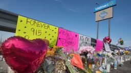 Flowers and signs at a makeshift memorial after the shooting that left 21 people dead at the Cielo Vista Mall WalMart in El Paso, Texas.