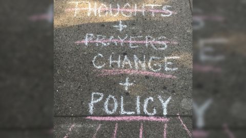 Chalk messages adorn the streets of the Oregon District where the deadly shooting happened Sunday morning.