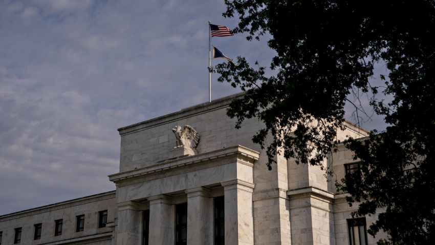 An American flag flies outside the Marriner S. Eccles Federal Reserve building in Washington, D.C., U.S., on Wednesday, July 31, 2019. The Federal Reserve is widely expected to lower interest rates by a quarter-point at its meeting that concludes Wednesday and leave the option open for additional moves despite demands by President Donald Trump for a "large" rate cut. Photographer: Andrew Harrer/Bloomberg via Getty Images