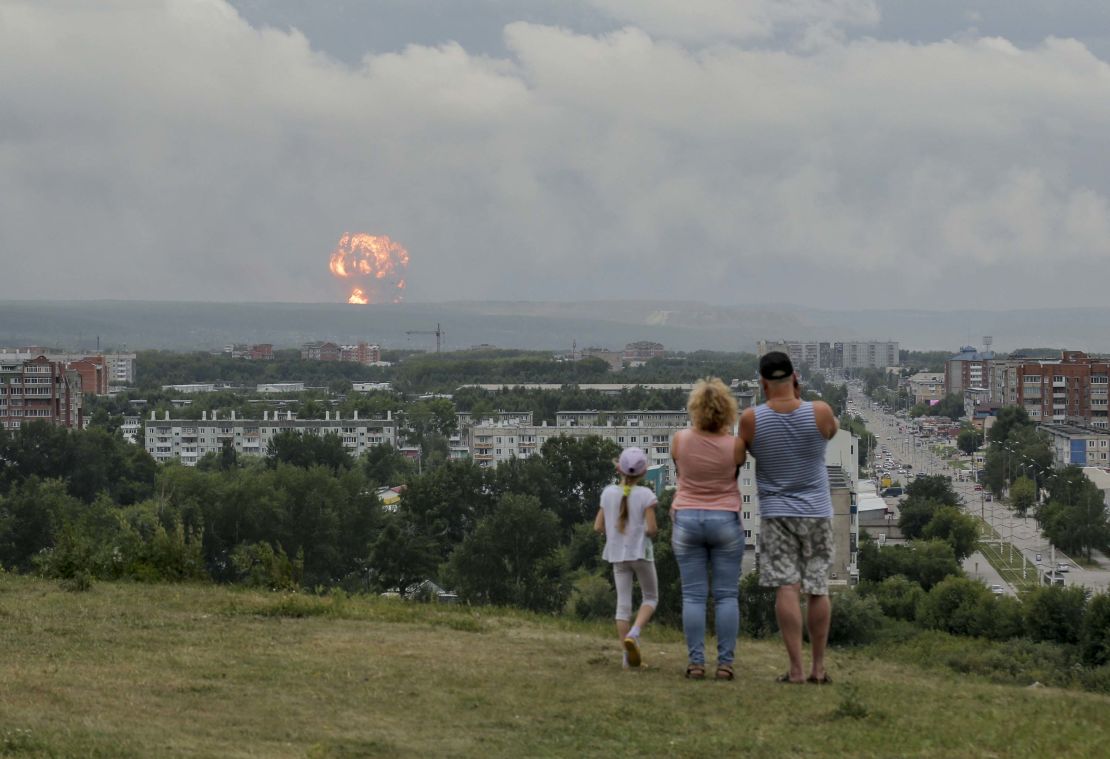 Dozens were injured in a series of explosions at munitions dump in Achinsk.