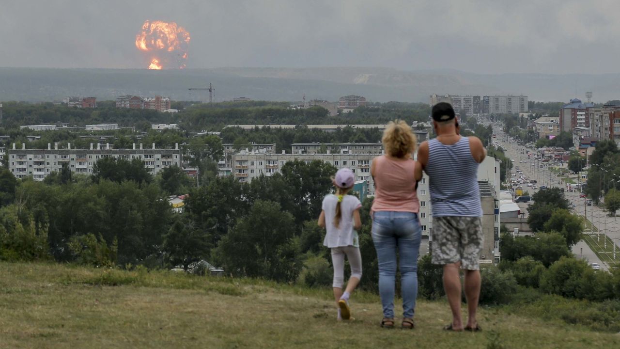 Dozens were injured in a series of explosions at munitions dump in Achinsk.