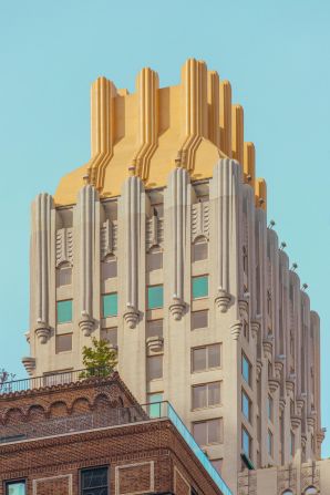 "This was shot with a zoom lens of Fifth Avenue. The Art Deco yellow at the top of that building is absolutely incredible. This is probably one of the most popular images from the series."