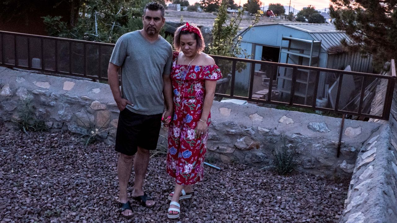 Armando Diaz, a small business owner, and his wife Alma Diaz pose Tuesday outside their home in Socorro, Texas.