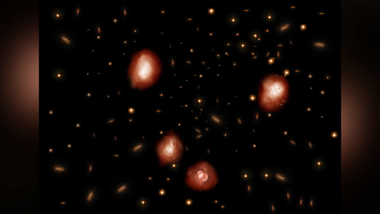 This is an artist's impression of the ancient massive and distant galaxies observed with ALMA. 