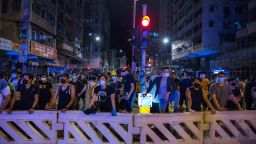 HONG KONG, CHINA - AUGUST 6: Protestors stand off against riot police after a student's arrest at Sham Shui Po district on August 06, 2019 in Hong Kong, China. Pro-democracy protesters have continued rallies against a controversial extradition bill since June 9, when the city was plunged into crisis after waves of demonstrations and several violent clashes. While Hong Kong's Chief Executive Carrie Lam apologized for introducing the bill and declared it "dead," protests have continued to draw large crowds with demands for Lam's resignation and complete withdrawal of the bill. (Photo by Billy H.C. Kwok/Getty Images)