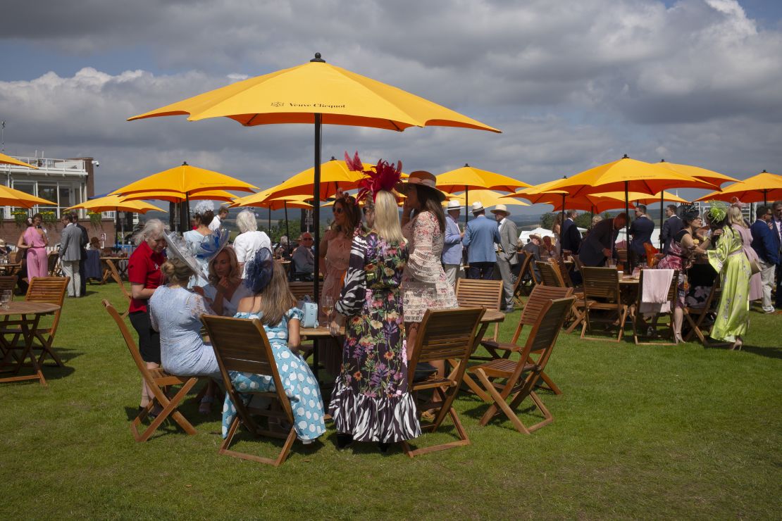 Racegoers relax at Glorious Goodwood.