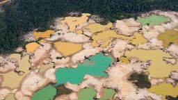 Land degradation, including deforestation, produces almost a quarter of the world's greenhouse gas emissions. Pictured: An aerial view over a chemically deforested area of the Amazon jungle caused by illegal mining activities in the river basin of the Madre de Dios region in southeast Peru, on May 17, 2019.