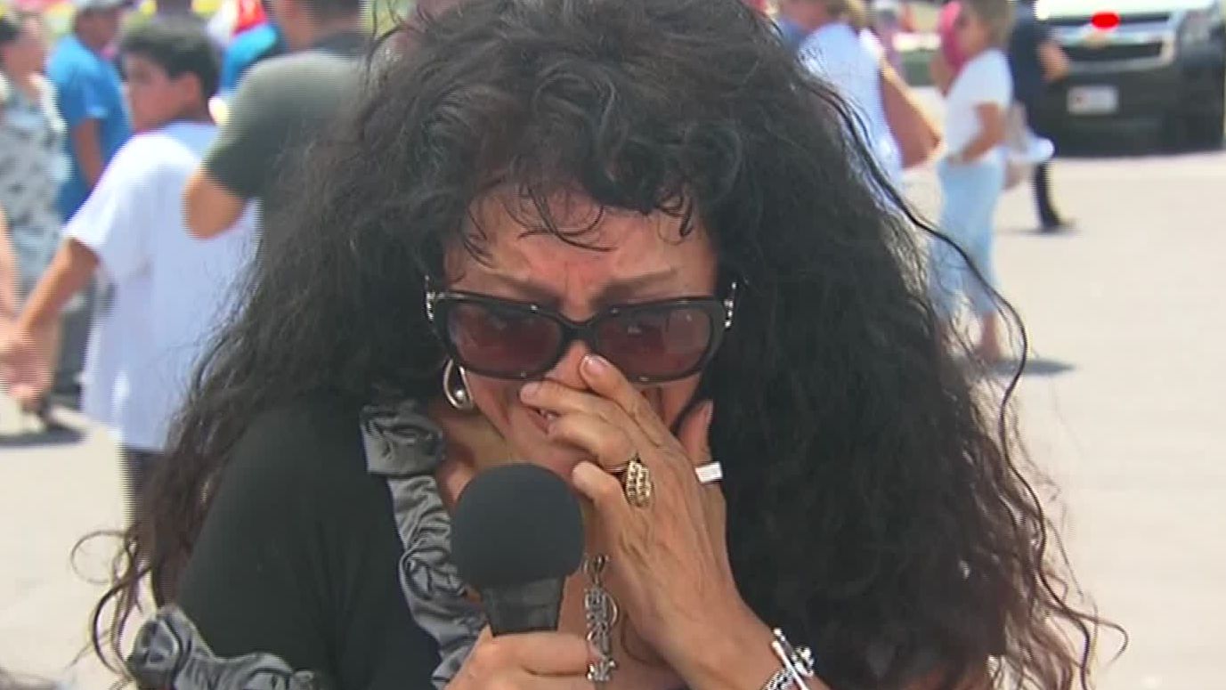 Sylvia Saucedo, 58, breaks down speaking to a reporter after the shooting.