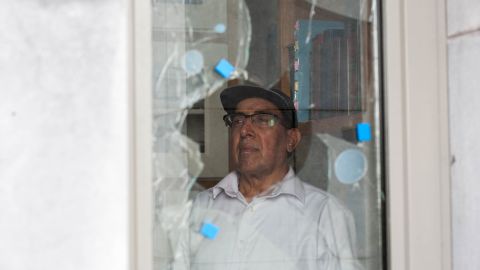A caretaker at the Galway Maryam Mosque surveys damage from the July attack.