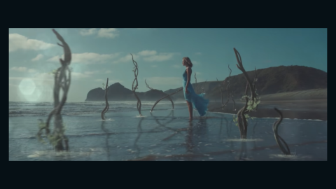 A still from Taylor Swift's "Out of the Woods" video clip.