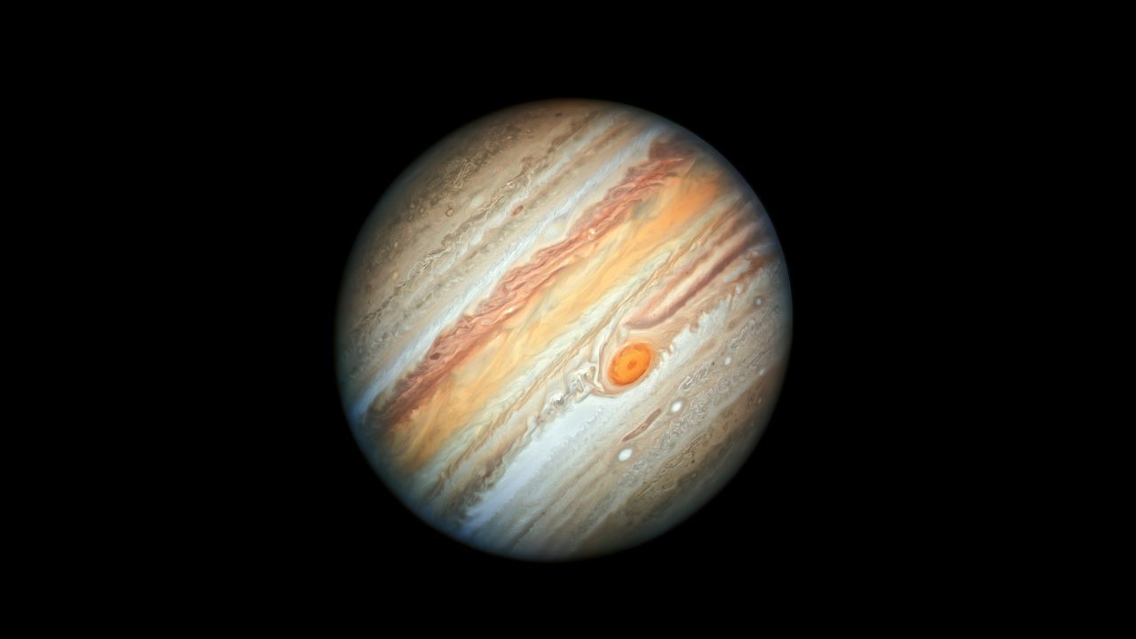 The Hubble Space Telescope took a dazzling new portrait of Jupiter, showcasing its vivid colors and swirling cloud features in the atmosphere.