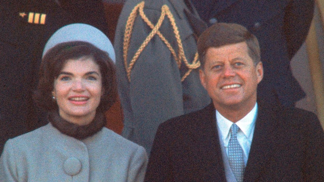 DISTRICT OF COLUMBIA, UNITED STATES - 1961:  President Kennedy (R) with First Lady Jackie (L) (in fur-trimmed suit designed by Oleg Cassini) at his inauguration.  (Photo by Leonard McCombe/Life Magazine/The LIFE Picture Collection via Getty Images)