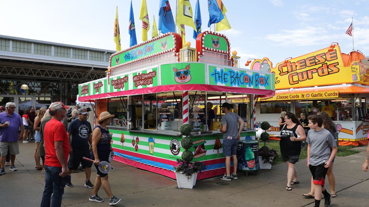 The Bacon Box serves Bacon Balls on a Stick, Bacon Pecan Pie on a Stick and other pork-themed delights at the Iowa State Fair' August 08, 2019 in Des Moines, Iowa. 