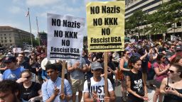 Demonstrators opposed to a far-right rally being held near the White House gather August 12, 2018 in Washington, DC, one year after deadly violence at a similar protest in Charlottesville, Virginia. - Last year's protests in Charlottesville, Virginia, that left one person dead and dozens injured, saw hundreds of neo-Nazi sympathizers, accompanied by rifle-carrying men, yelling white nationalist slogans and wielding flaming torches in scenes eerily reminiscent of racist rallies held in America's South before the Civil Rights movement. (Photo by Nicholas Kamm / AFP)        (Photo credit should read NICHOLAS KAMM/AFP/Getty Images)
