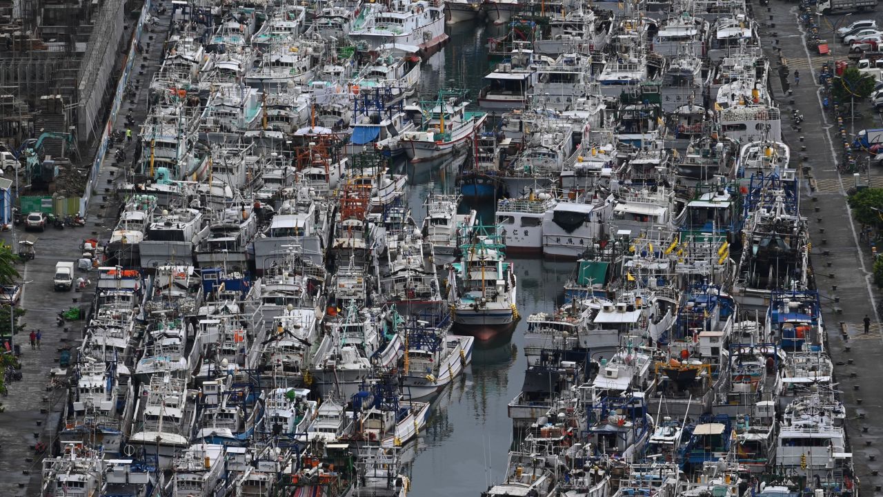 Fishing boats packed into the typhoon shelter in Nanfangao Harbour in Suao, Yilan county, Taiwan, as Typhoon Lekima approaches on August 8, 2019. 