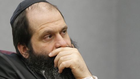 Defendant Sholom Rubashkin listens to Rodney Heaston, not pictured, with Mechanical Industrial Services, testify during trial at the Black Hawk County Courthouse in Waterloo, Iowa on Tuesday, June 1, 2010. Rubashkin faces 83 counts of child labor violations stemming from a May 2008 immigration raid at the Agriprocessors Inc. kosher meatpacking plant in Postville. (AP Photo/The Waterloo Courier, Matthew Putney)