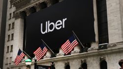NEW YORK, NEW YORK - MAY 10: The Uber banner hangs outside of the   New York Stock Exchange (NYSE) before the Opening Bell at the NYSE as the ride-hailing company Uber makes its highly anticipated initial public offering (IPO) on May 10, 2019 in New York City. Uber will start trading on the New York Stock Exchange after raising $8.1 billion in the biggest U.S. IPO in five years.Thousands of Uber and other app based drivers protested around the country on Wednesday to demand better pay and working conditions including sick leave, over time and a minimum wage. (Photo by Spencer Platt/Getty Images)