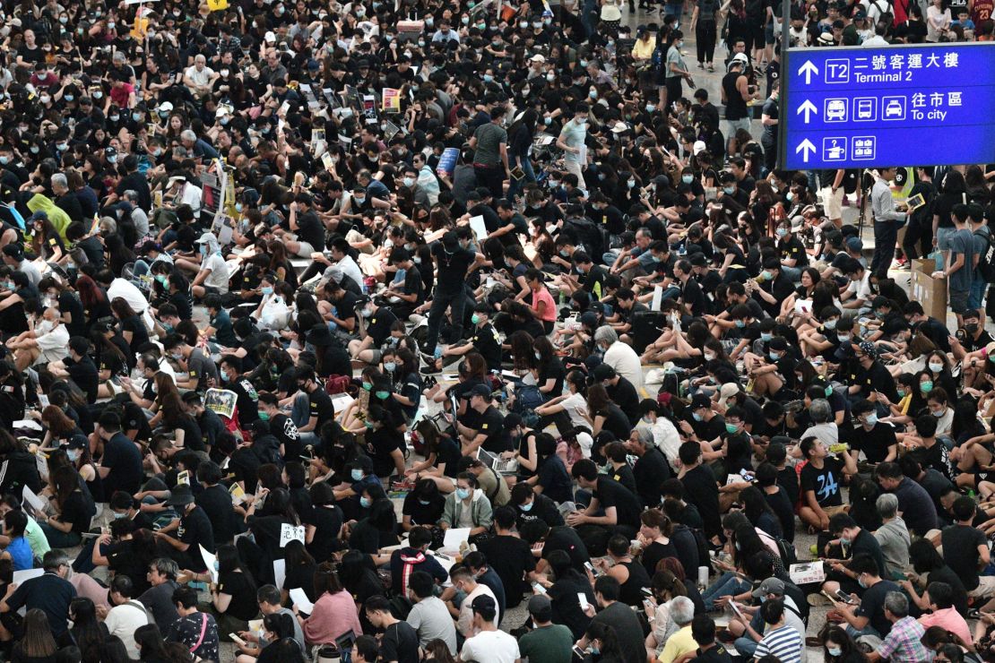 Protesters rally against a controversial extradition bill at Hong Kongs international airport on August 9, 2019.