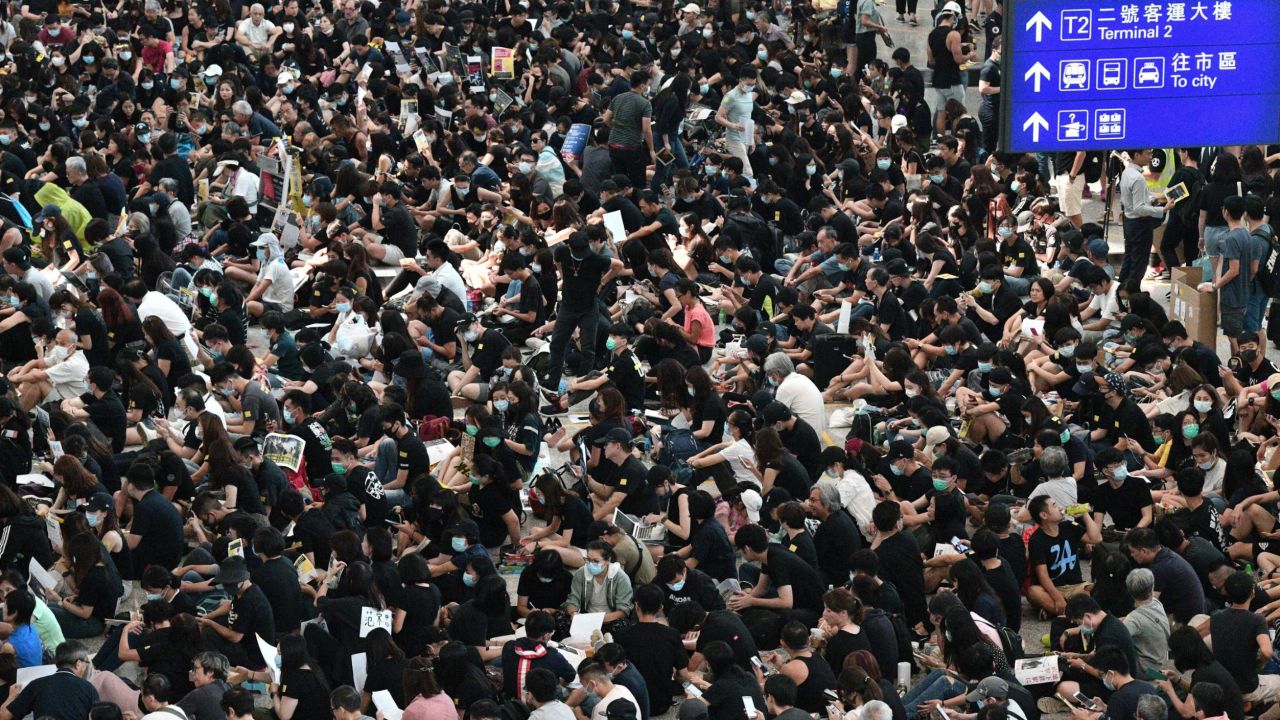 Protesters rally against a controversial extradition bill at Hong Kongs international airport on August 9, 2019.