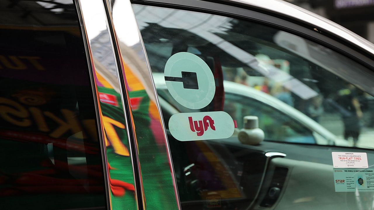 NEW YORK, NY - JULY 30:  A Lyft ride hailing vehicle moves through traffic in Manhattan on July 30, 2018 in New York City. After a significant increase in local traffic and a spate of suicides by taxi drivers, New York City is planning to vote on capping ride-sharing services such as Uber and Lyft. The  City Council's move to vote on the measures could come as soon as Aug. 8. If the vote was to succeed, New York City would become the first major U.S. municipality to cap ride-sharing services.  (Photo by Spencer Platt/Getty Images)