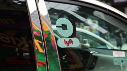 NEW YORK, NY - JULY 30:  A Lyft ride hailing vehicle moves through traffic in Manhattan on July 30, 2018 in New York City. After a significant increase in local traffic and a spate of suicides by taxi drivers, New York City is planning to vote on capping ride-sharing services such as Uber and Lyft. The  City Council's move to vote on the measures could come as soon as Aug. 8. If the vote was to succeed, New York City would become the first major U.S. municipality to cap ride-sharing services.  (Photo by Spencer Platt/Getty Images)